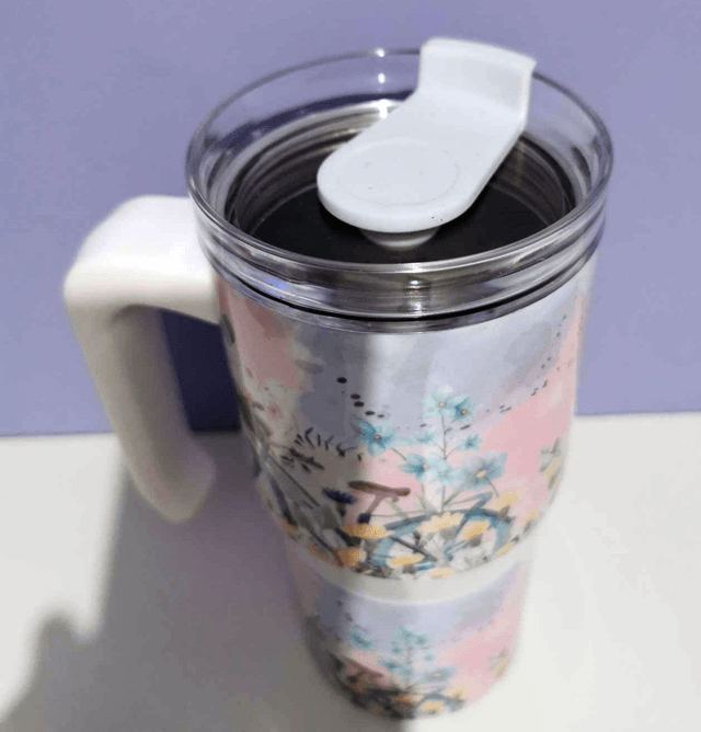 Mug isotherme 600 ml "le vélo dans le jardin"